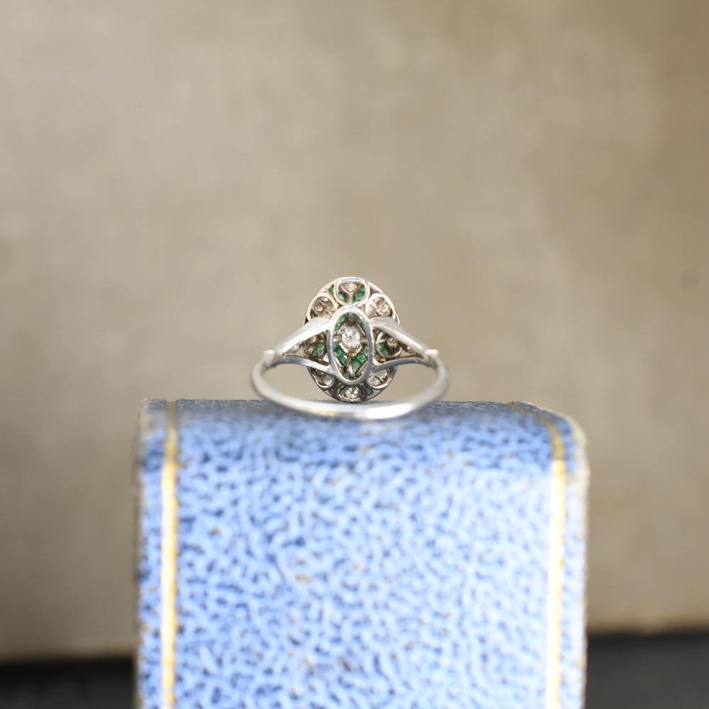 Edwardian diamond Emerald Platinum cluster ring c1910
