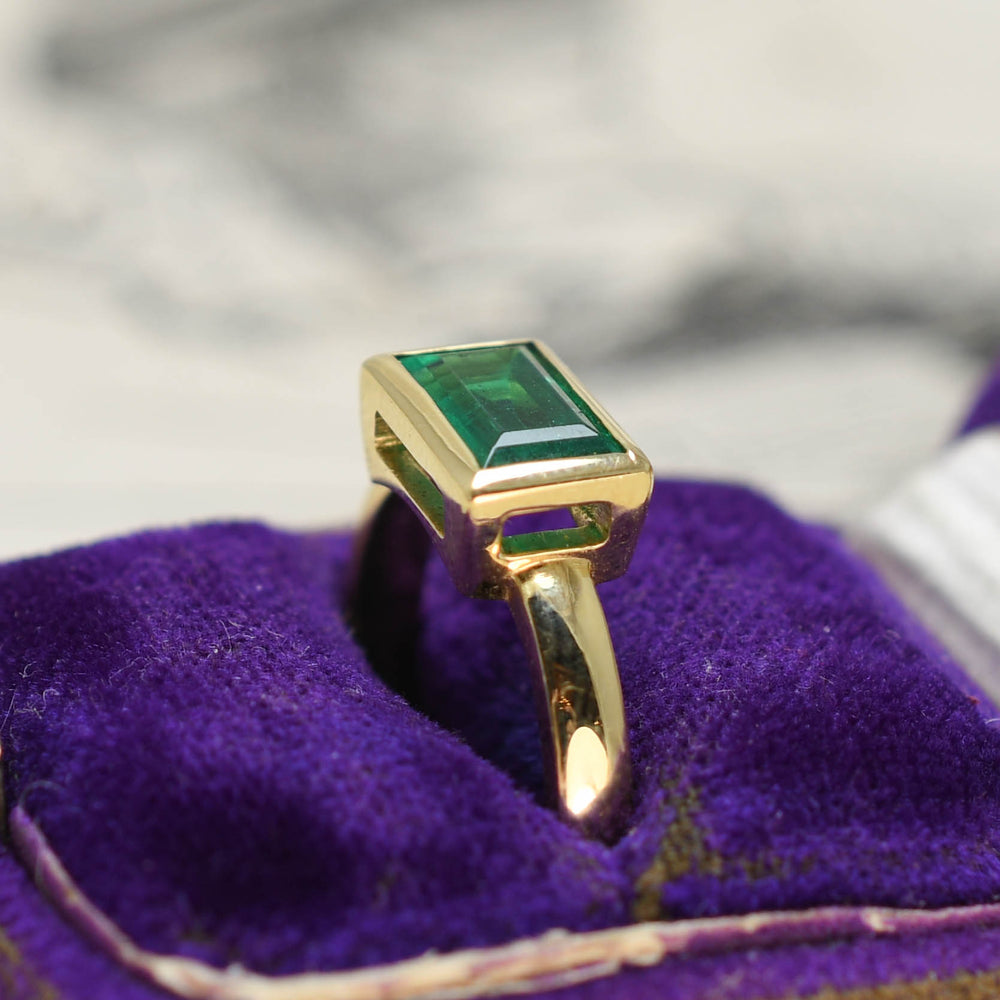 Vintage East-West Emerald Solitaire Ring