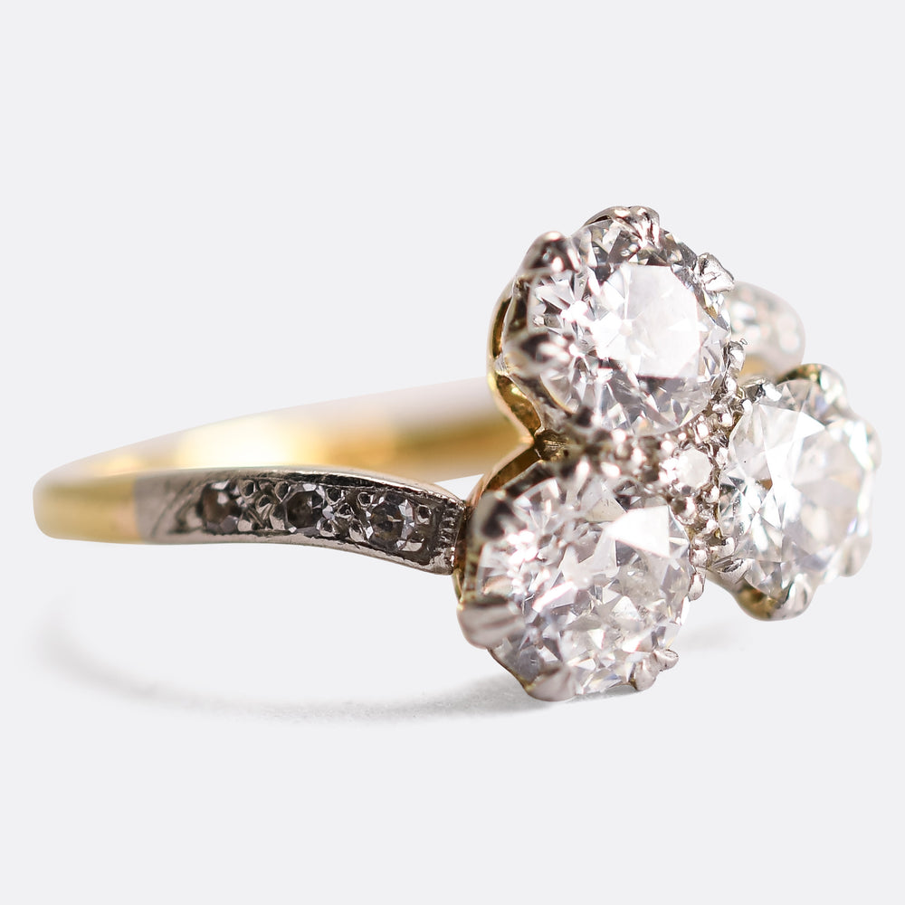 Art Nouveau Three-Stone Diamond Crossover Engagement Ring