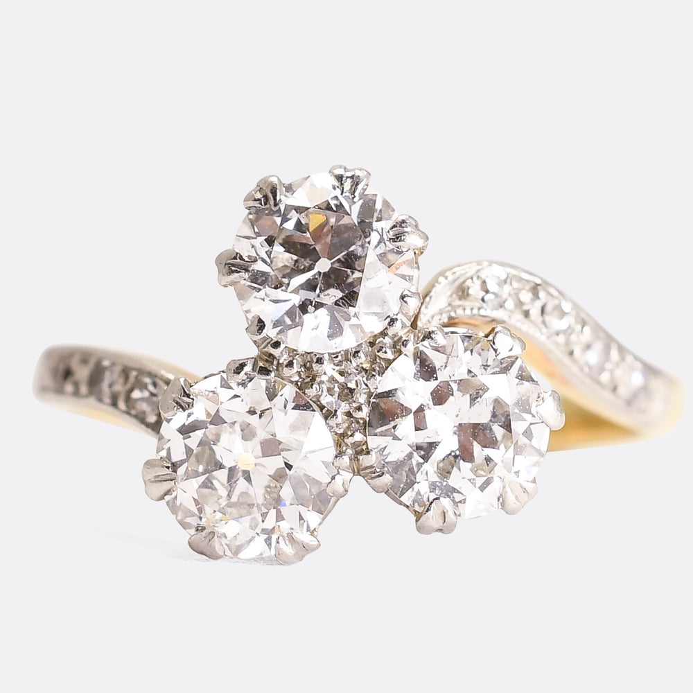 Art Nouveau Three-Stone Diamond Crossover Engagement Ring