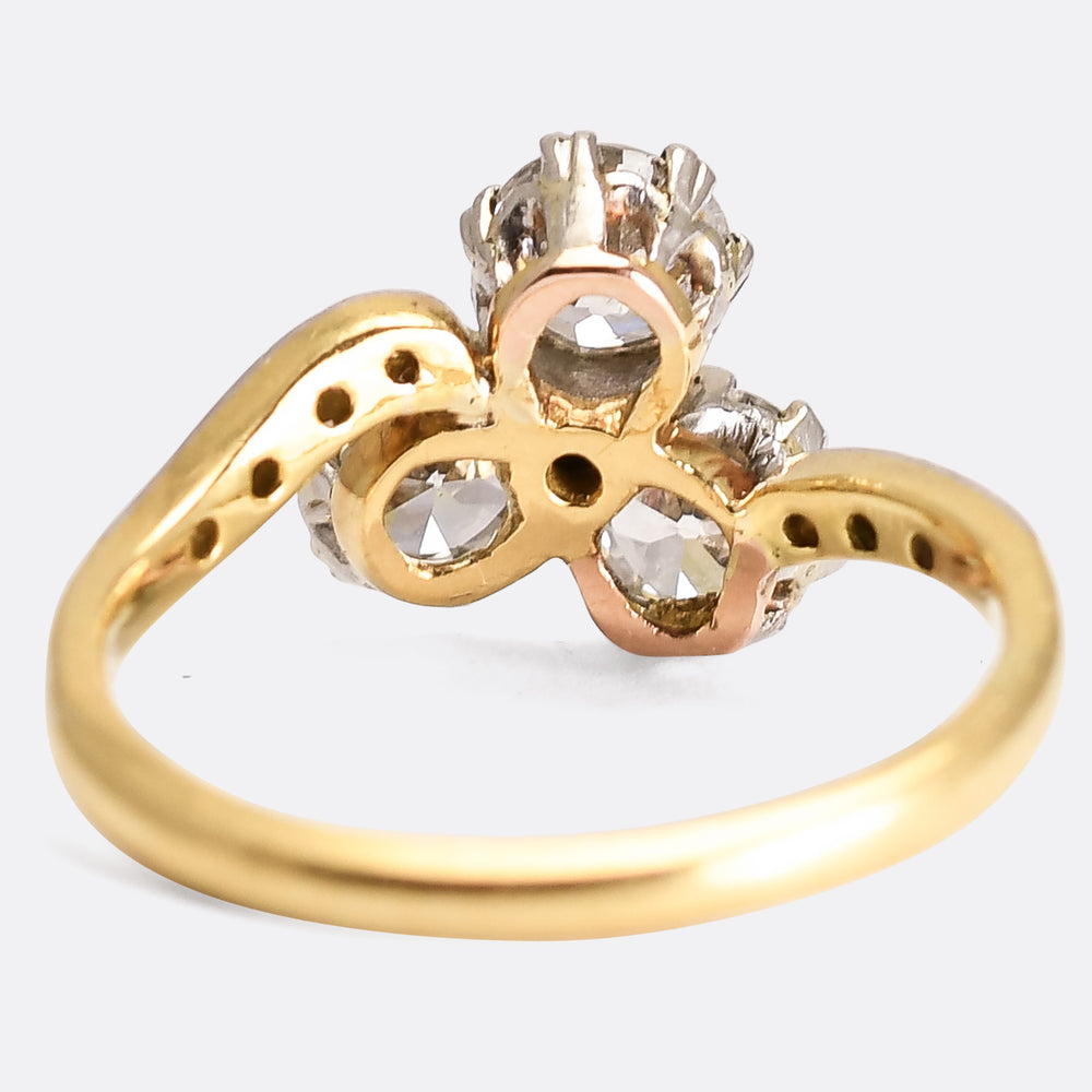 Art Nouveau Three-Stone Diamond Crossover Engagement Ring
