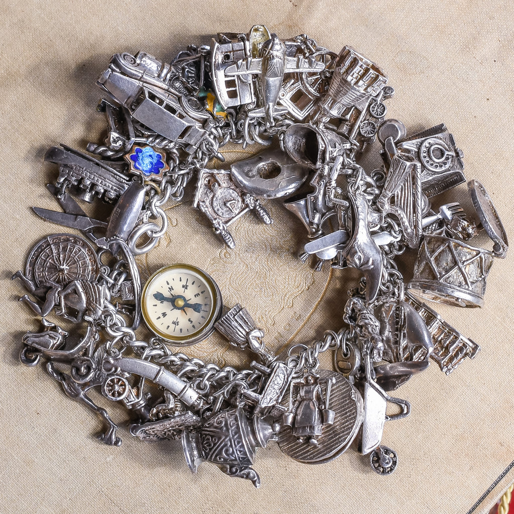 STERLING CHARM BRACELET 18 CHARMS 1960s (item #1159315)