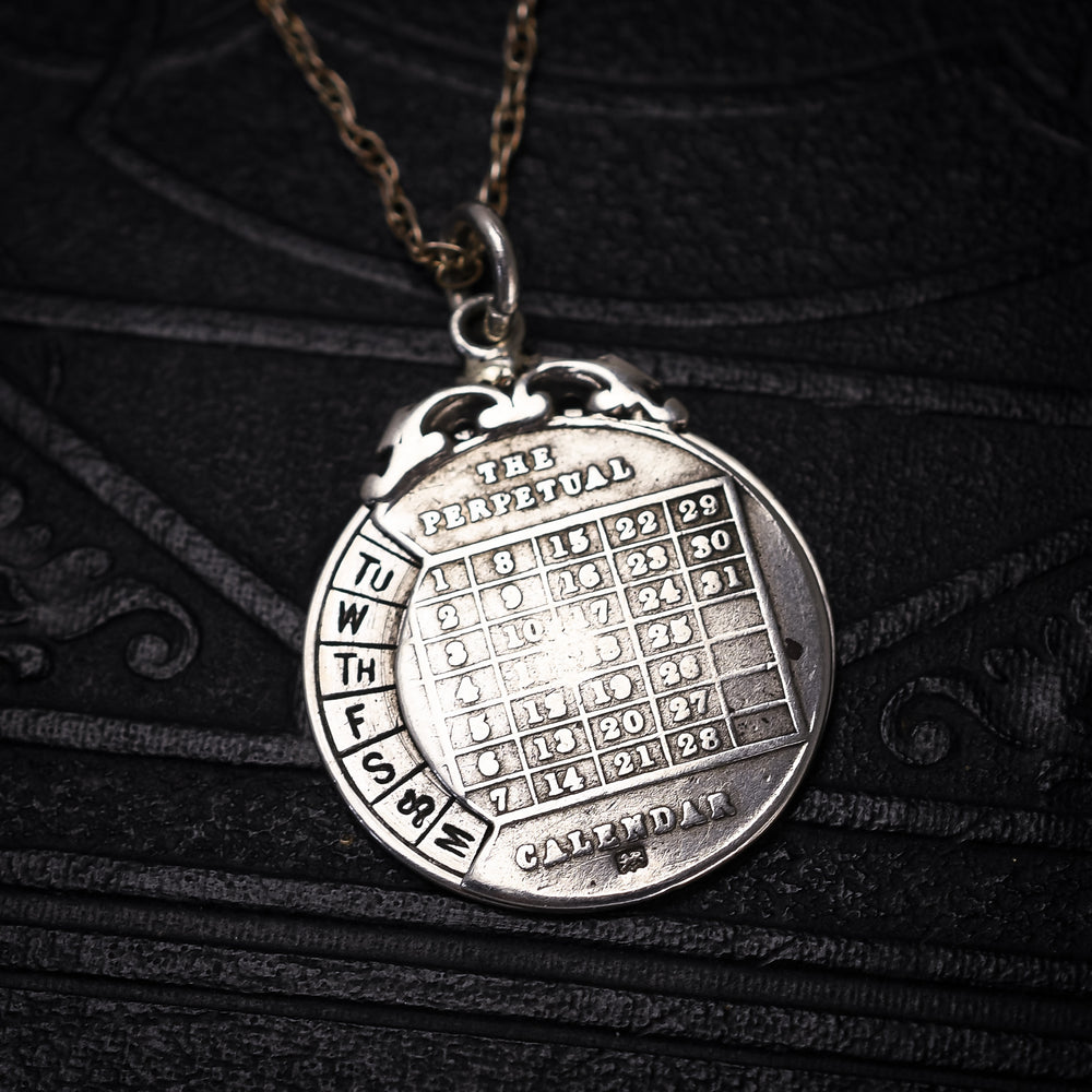 Edwardian Silver Perpetual Calendar Pendant