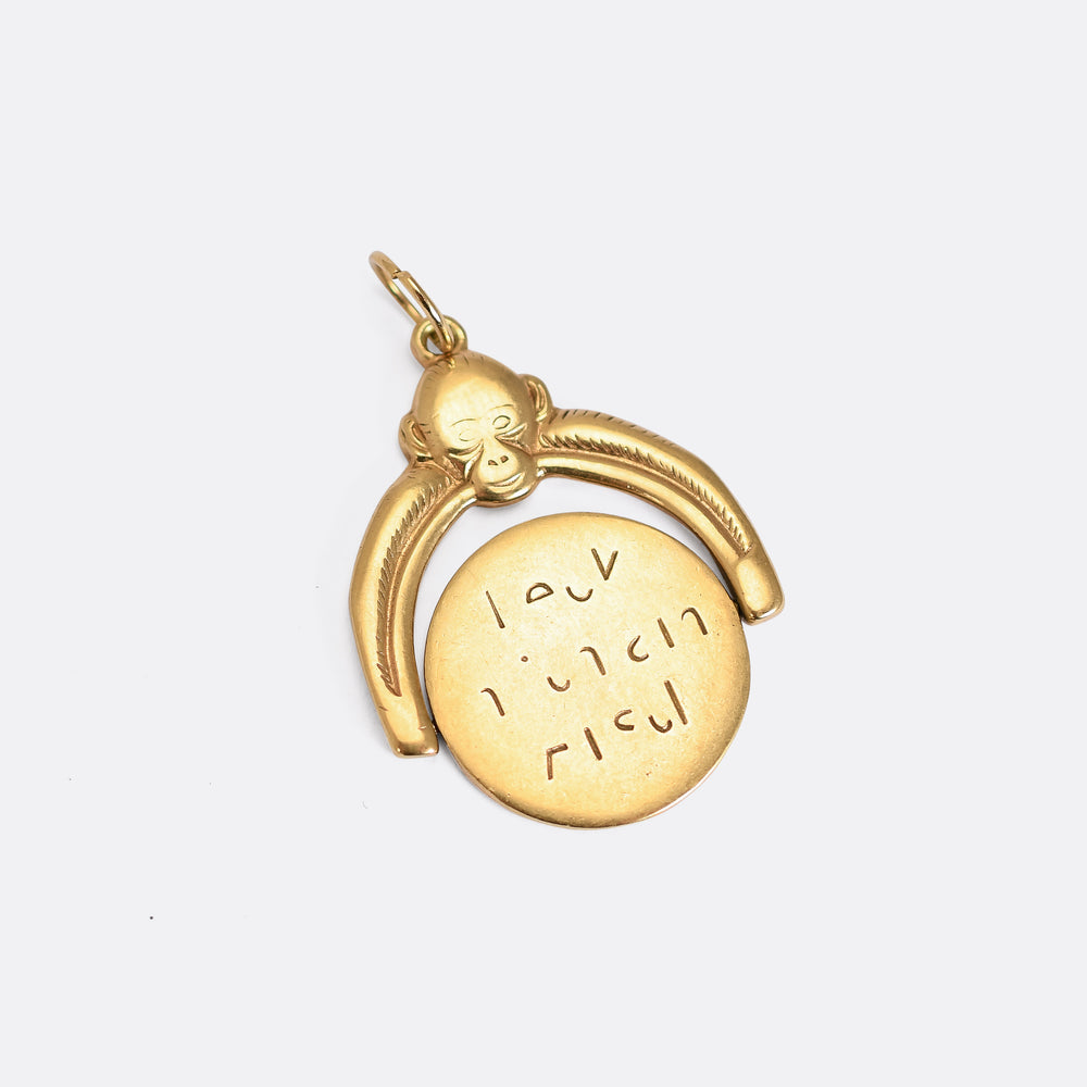1950's Gold Kiss My Ass Spinner Pendant