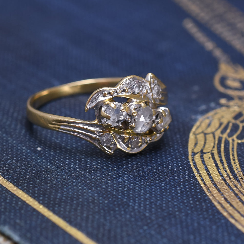Art Nouveau Three-Stone Diamond Foliate Crossover Ring