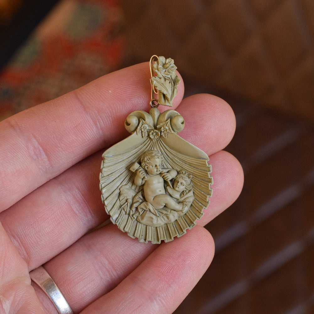 Mid-Victorian Cupid Carving Aphrodite Lava Cameo Pendant