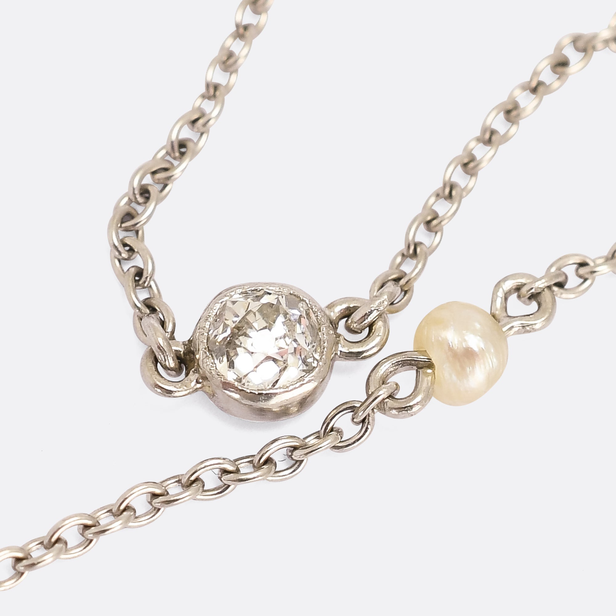 CHANEL SILVER TWIST CC LOGO CRYSTAL PEARL PENDANT PEARL DROP NECKLACE